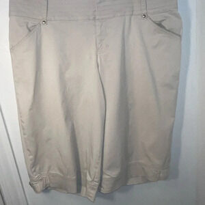Venezia 16, tan flared Bermuda shorts. cuffed hem w/ belt zipper hook ,button